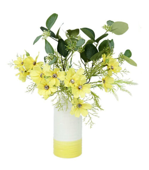 Yellow/white ceramic vases with artifical flowers