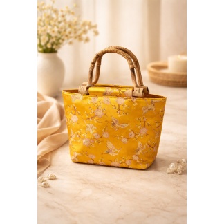 Elegante mosterdgele Mihella handtas met kraanvogelmotief en bamboe-look hengsels